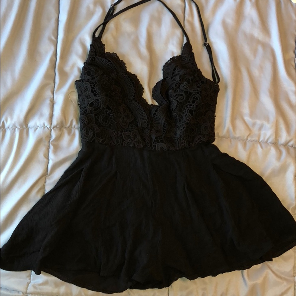 Really cute backless black short romper